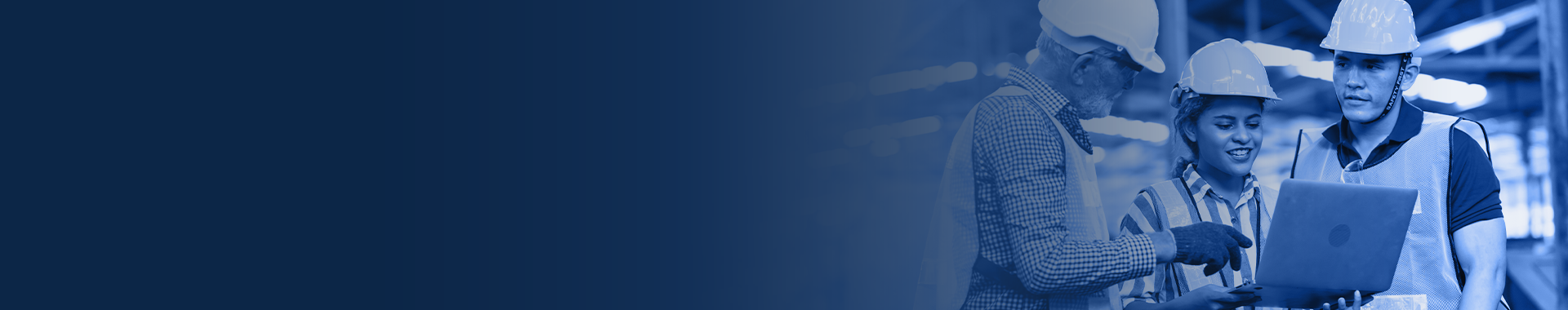 technicians having a discussion around a laptop in an  industrial setting with a dark blue overlay