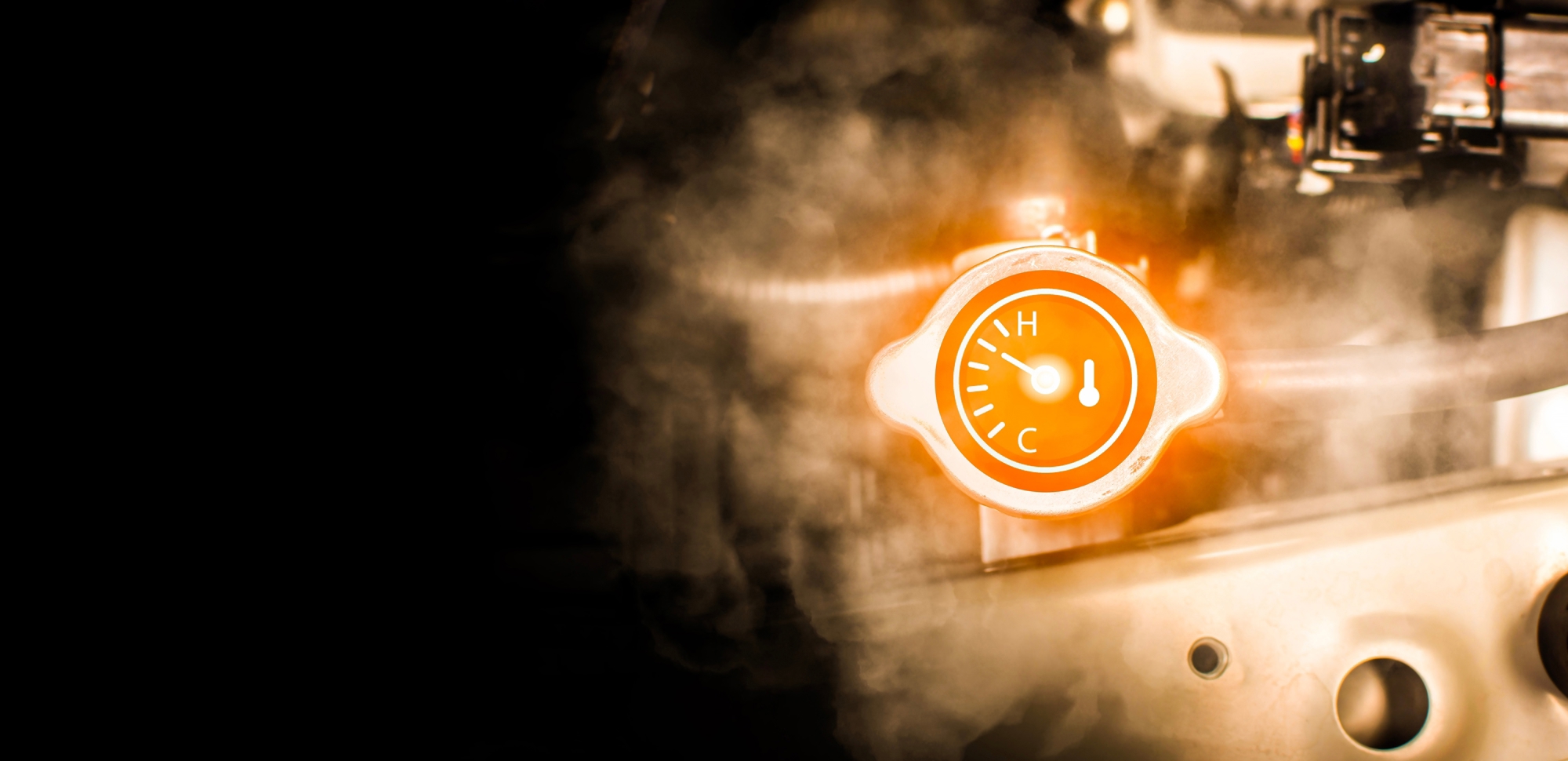glowing orange gauge in front of a steam filled factory floor