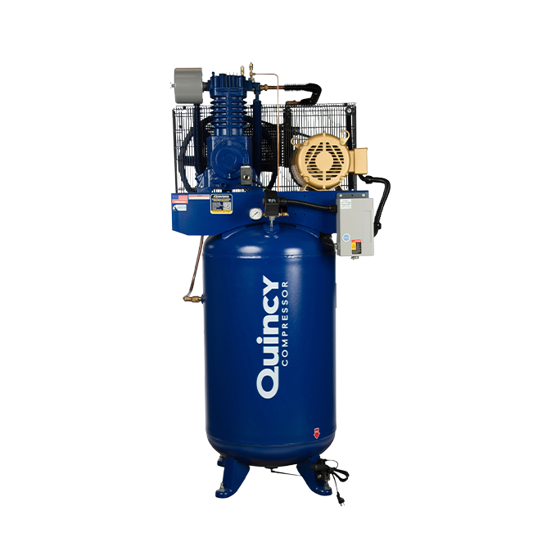 Quincy QT5-15 air compressor unit- a 2-stage air pump with cooling fins and motor within a wire belt shroud and a grey control box on top of a vertically oriented receiver tank. All painted blue